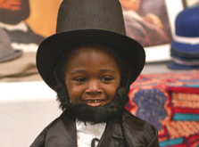 Boy wearing Lincoln hat